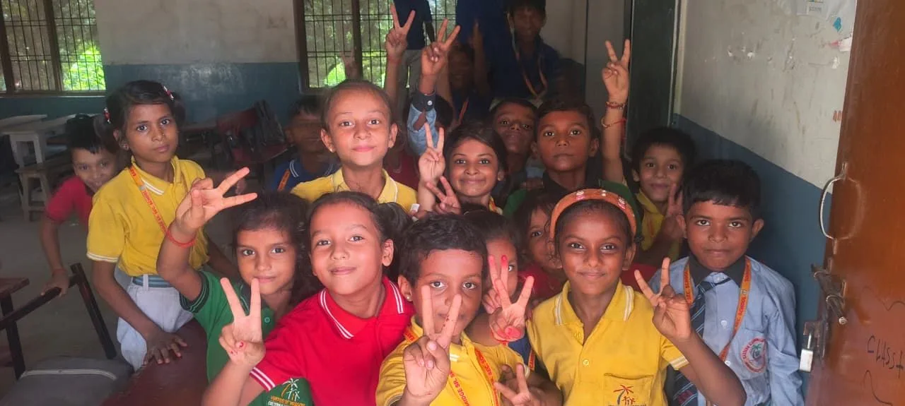 Students cheering in their classroom
