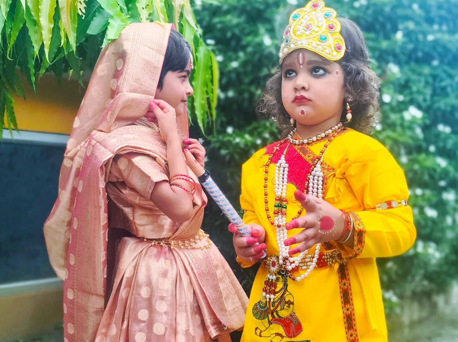 Students dressed as Radha and Krishna for Janmashtami